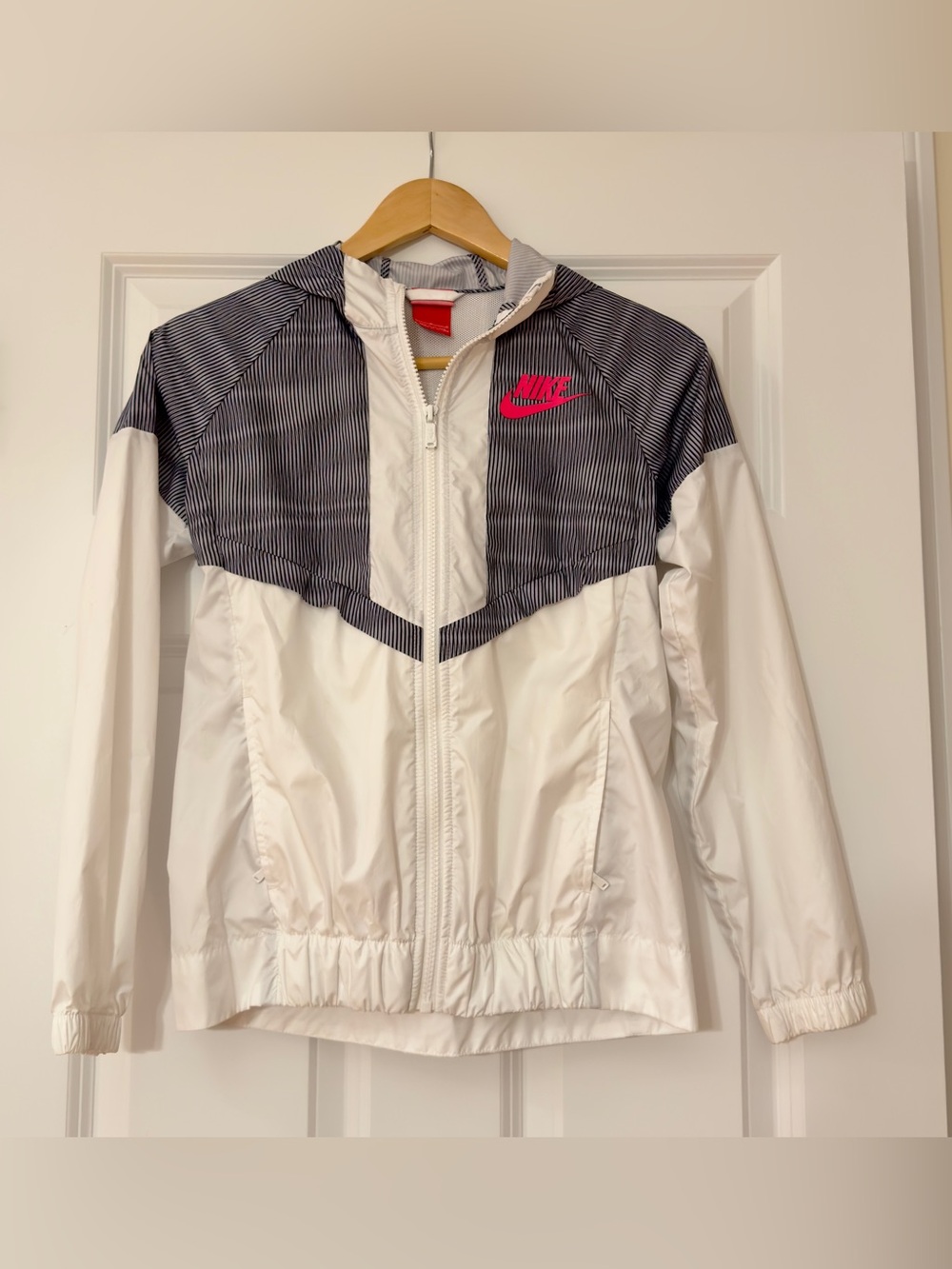 Kids Nike White Hooded Windbreaker with Black Pinstripe Yoke and Pink Logo